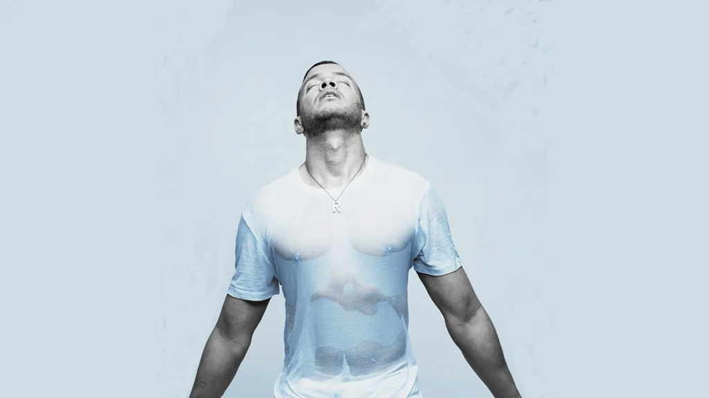 Rihan in white wet t-shirt - muscle tones can be seen through!