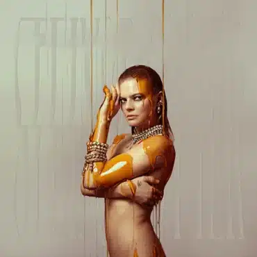 Steinsdotter - "Honeybee" - naked yet covered - golden honey cascading over her form.
